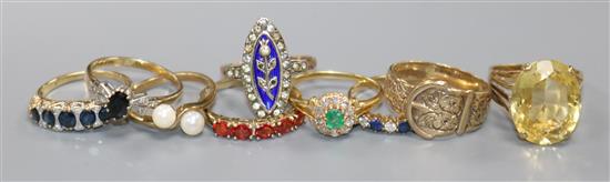 Nine assorted 9ct gold rings including gem set.